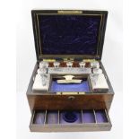 A VICTORIAN WALNUT LADY'S TRAVELLING CASE, fitted interior with silver mounted glass appointments