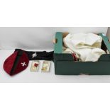 A KNIGHTS TEMPLAR MASONIC SELECTION OF REGALIA, includes; tunic, mantel, cap with cross, sash, black