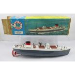 A TRI-ANG SCALEX CLOCKWORK MODEL OF AN MS OCEAN MERCHANT CARGO SHIP ref. 4355, original vendor's box