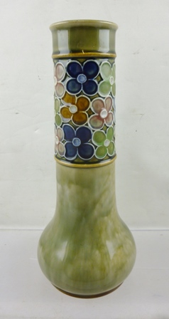 A ROYAL DOULTON STONEWARE VASE of cylindrical form with bulbous base, mottled green ground with tube
