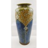 A ROYAL DOULTON STONEWARE VASE having blue mottled body with green mottled shoulders, tube lined and
