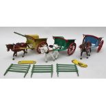 THREE BRITAINS TUMBREL CARTS each with shire horse and two with raves