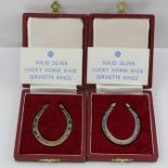 A PAIR OF SILVER "LUCKY HORSESHOE" NAPKIN RINGS, Sheffield 1977, in vendor's boxes, total weight