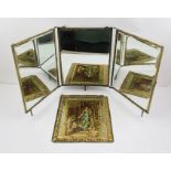 A LATE 19TH CENTURY CONTINENTAL BRASS FRAMED FOLDING TRIPLE GLASS VANITY MIRROR, set with a