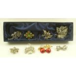 A SELECTION OF COSTUME BROOCHES comprising; four marcasite and four paste set (8)