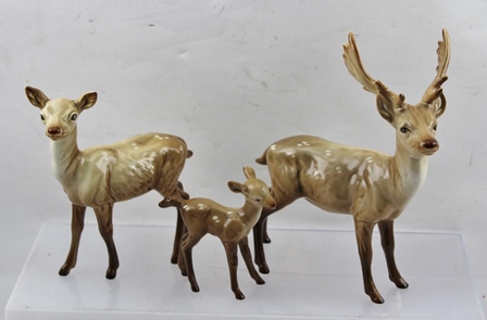 A BESWICK DEER FAMILY with Stag, Doe and Faun; stag to tips of antlers, 19.5cm high