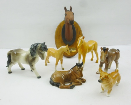 A ROYAL WORCESTER BONE CHINA CORGI no.3243, together with a quantity of horse china ornaments,