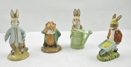 THREE BESWICK "BEATRIX POTTER" FIGURES "Peter Rabbit Digging", "The Head Gardener", "Peter in the