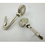 TWO SILVER NAPKIN CLIPS, 1904 and 1917