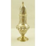 A LATE VICTORIAN SILVER SUGAR CASTER of Georgian design, wrythen embossed with blind cartouche,