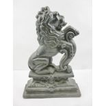 A CAST IRON LION DOORSTOP, 36cm high