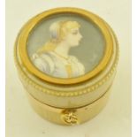 AN EARLY 19TH CENTURY IVORY PATCH BOX, the cover inset with a miniature portrait painting of a young