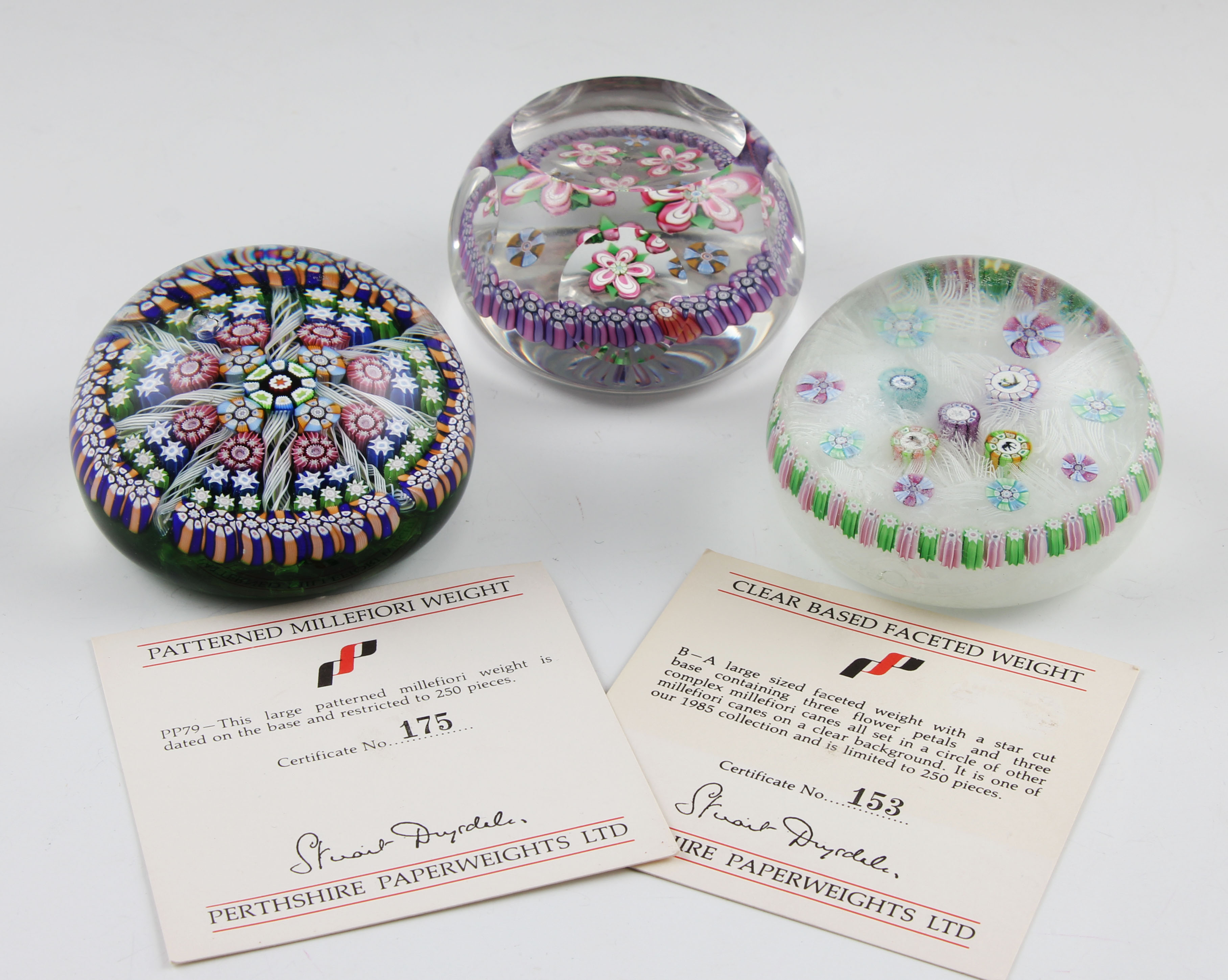 A group of three Perthshire millefiori glass paperweights to include; one having four animal grinder - Image 2 of 2