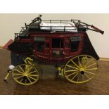 A Franklin Mint Wells Fargo stagecoach with original box.