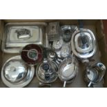 A collection of plated ware to include trinket boxes, a four piece tea set, a muffin dish, a tray,