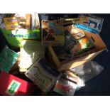 Three boxes of toys including Meccano Jigsaw puzzle maker, , various jigsaws, Totopoly, Pegity,