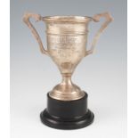 A silver twin-handled trophy engraved ‘Bournville Social Club Angling Section Challenge Cup