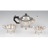 An Edwardian Walker & Hall silver bachelors tea set, comprising of a tea pot, sugar bowl and milk