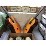 Two nylon strung acoustic guitars.