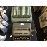 One Facit and one Sumlock adding machine.