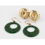 A pair of carved green hardstone earrings, with shepherd hook findings, together with a pair of