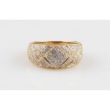 An 18ct yellow gold diamond ring, pave set with eight-cut diamonds in diamond design, hallmarked