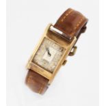 A gents 9ct yellow gold Dennison cased Art Deco wrist watch, the cream dial having hourly Arabic