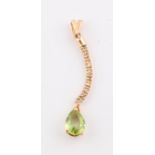 A peridot and diamond pendant, the curved design set with nine round brilliant cut diamonds,