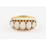 A five stone opal ring, set with five graduated oval opal cabochons, hallmark rubbed, ring size N½.