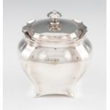 An early 20th Century silver lidded pot, with gilt interior, hallmarked Sheffield 1914, makers