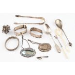 A collection of hallmarked silverware, to include a pair of Georgian sugar tongs, a pickle fork with