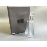 *A boxed Waterford Crystal 'MA WOOD GRAIN' decanter with stopper.