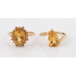Two hallmarked 9ct yellow gold citrine dress rings, ring sizes Q½ and Q.