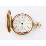 A gold plated full hunter crown wind Elgin Watch Co. pocket watch, the white dial having hourly