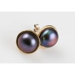 A pair of 9ct yellow gold mabe pearl earrings, each set with a black mabe pearl, diameter approx.