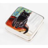 A silver and enamel pill box, of square form featuring enamel black cat design to lid, hallmarked