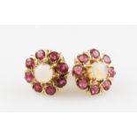 A pair of 9ct yellow gold ruby and opal cluster stud earrings, set with a central round opal