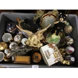 Two plastic boxes containing decorative mini teapots, egg shaped trinket boxes, clockwork bear,