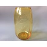 A James Powell & Sons 20th century dented amber glass vase, pattern 974. Height 32cm.