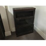 An oak globe Wernicke style three section bookcase.