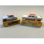 A Dinky 106 Austin Atlantic conertible and 192 De Soto firelite sedan, in boxes. (NO CONDITION