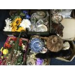 Six crates containing plates, flowers and furs.