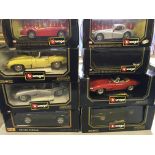 Seven Burago and one Maisto boxed model Jaguars including XK 120 roadster ('48), 'E' cabriolet (