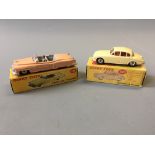 A Dinky 131 Cadillac tourer and 195 Jaguar 3.4 Saloon, in boxes. (NO CONDITION REPORT, VIEWING OF