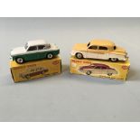 A Dinky 168 Singer Gazelle and 172 Studebaker land cruiser, in boxes. (NO CONDITION REPORT,