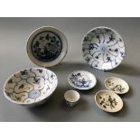 Tek Sing shipwreck blue/green and white pottery including two large and three small dishes, one