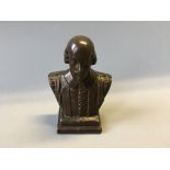 A bronze paperweight bust of William Shakespeare. Height 11cm.