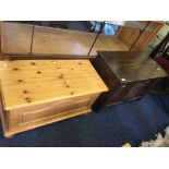 An oak blanket box and a pine blanket box.