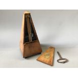 A mahogany cased metronome Maelzel with key, marked J.T.L. to front.