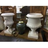 A pair of white glazed vases with a lamp stand and four various pictures.